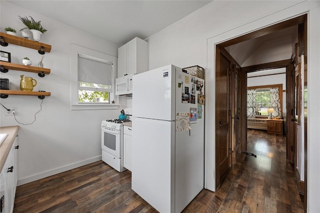 540 E 4th St, Tipton, IA 52772 - kitchen featuring white appliances, dark wood-style flooring, white cabinets, open shelves, and baseboards