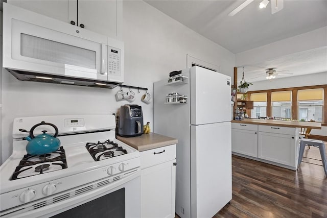 540 E 4th St, Tipton, IA 52772 - kitchen featuring white appliances, ceiling fan, dark wood finished floors, white cabinetry, and butcher block countertops