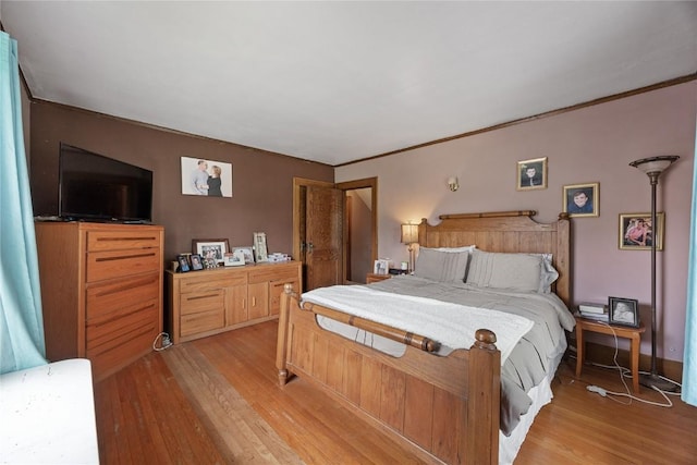 540 E 4th St, Tipton, IA 52772 - bedroom featuring light wood-type flooring