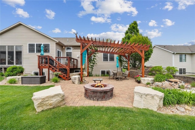 1617 Hunters Field Ln, Marion, IA 52302 - back of house with an outdoor fire pit, a patio, a pergola, a wooden deck, and a lawn