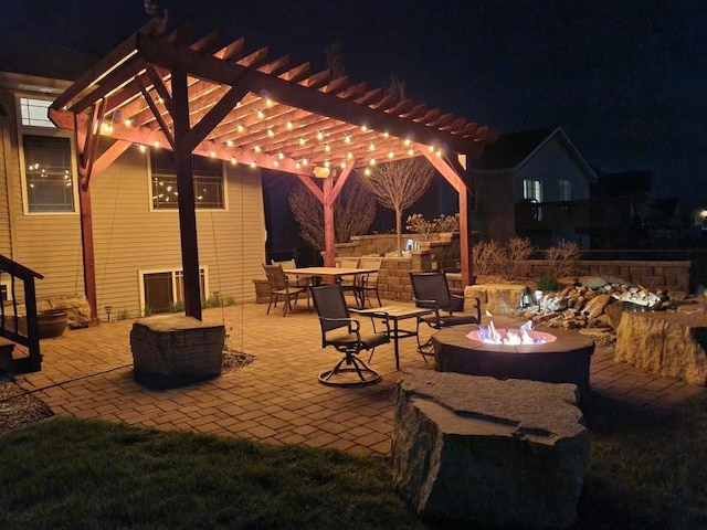 1617 Hunters Field Ln, Marion, IA 52302 - patio at twilight with a fire pit, a patio, and a pergola