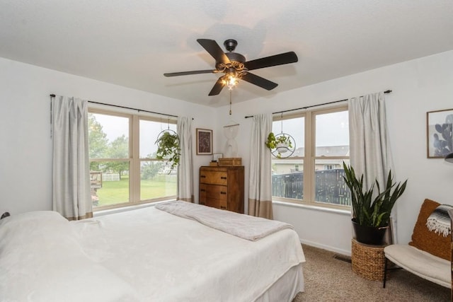 2806 Dawn Ave SW, Cedar Rapids, IA 52404 - carpeted bedroom featuring ceiling fan and baseboards