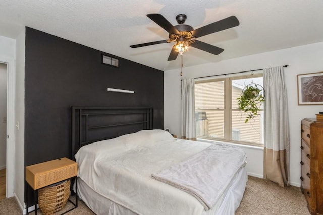 2806 Dawn Ave SW, Cedar Rapids, IA 52404 - bedroom featuring light colored carpet and ceiling fan