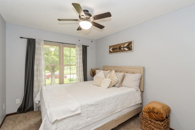 2806 Dawn Ave SW, Cedar Rapids, IA 52404 - carpeted bedroom with a ceiling fan and baseboards