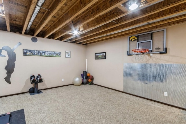 2806 Dawn Ave SW, Cedar Rapids, IA 52404 - workout room featuring baseboards and carpet flooring