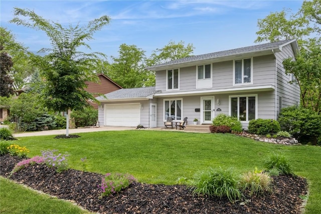 2232 Birchwood Dr NE, Cedar Rapids, IA 52402 - view of front of house featuring an attached garage, a front lawn, driveway, and roof with shingles