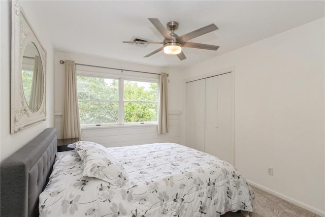 2232 Birchwood Dr NE, Cedar Rapids, IA 52402 - carpeted bedroom featuring a closet, baseboards, and ceiling fan
