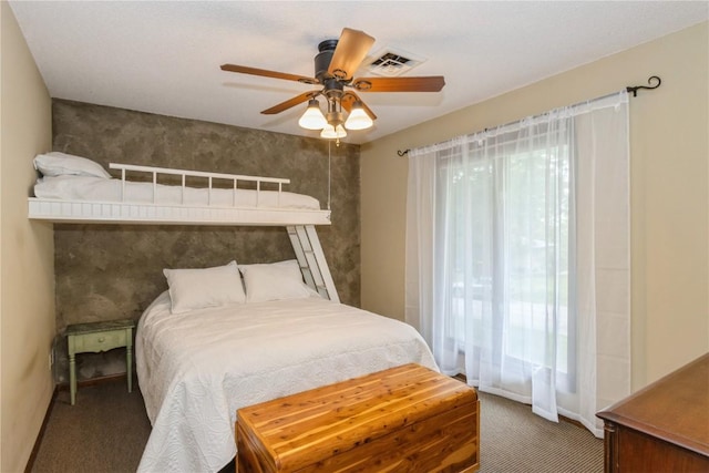 2232 Birchwood Dr NE, Cedar Rapids, IA 52402 - bedroom with carpet flooring and ceiling fan