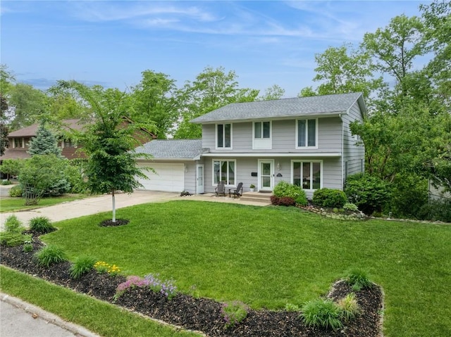 2232 Birchwood Dr NE, Cedar Rapids, IA 52402 - traditional-style house with a garage, concrete driveway, a front lawn, and a shingled roof