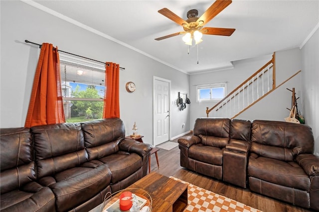 619 I Ave NW, Cedar Rapids, IA 52405 - living room with wood finished floors, crown molding, ceiling fan, stairway, and baseboards