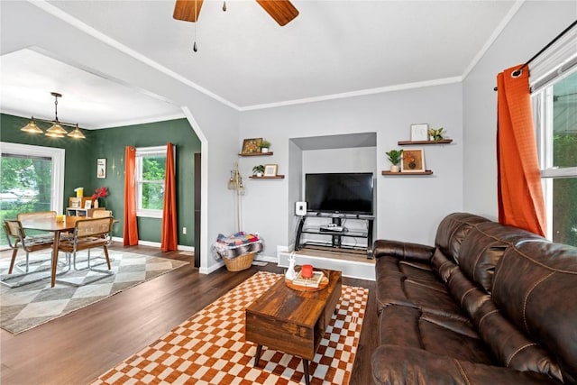 619 I Ave NW, Cedar Rapids, IA 52405 - living area with wood finished floors, a ceiling fan, ornamental molding, arched walkways, and baseboards
