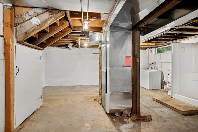 619 I Ave NW, Cedar Rapids, IA 52405 - basement featuring washer and clothes dryer and heating unit