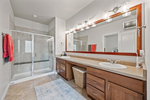 3355 Wild Rose Rd, Cedar Rapids, IA 52411 - full bathroom featuring double vanity, a shower stall, and tile patterned flooring