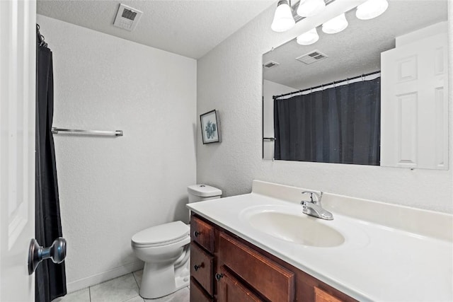 3107 Johnson Ave NW Unit 4, Cedar Rapids, IA 52405 - full bath featuring vanity, a textured wall, tile patterned floors, toilet, and a textured ceiling