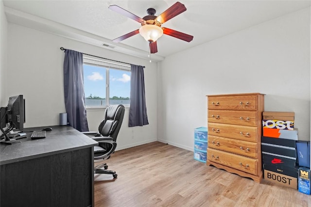 3107 Johnson Ave NW Unit 4, Cedar Rapids, IA 52405 - home office featuring light wood-type flooring and ceiling fan