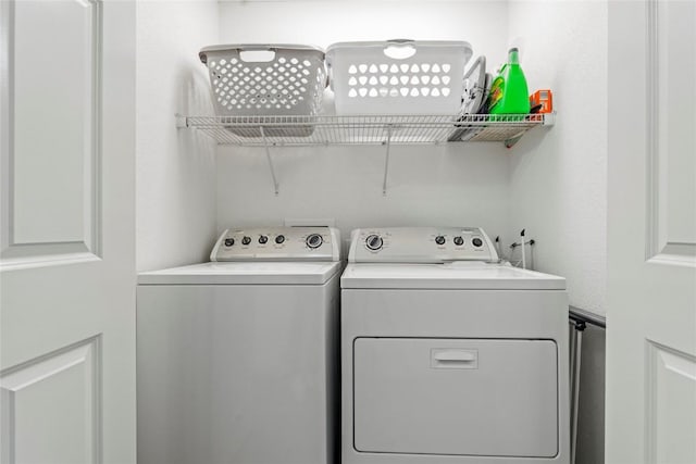 3107 Johnson Ave NW Unit 4, Cedar Rapids, IA 52405 - washroom with washing machine and clothes dryer