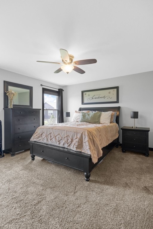 2205 Snapdragon Cir SW, Cedar Rapids, IA 52404 - bedroom featuring carpet floors and a ceiling fan