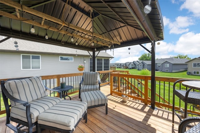 2205 Snapdragon Cir SW, Cedar Rapids, IA 52404 - wooden terrace with a residential view, a yard, and a gazebo