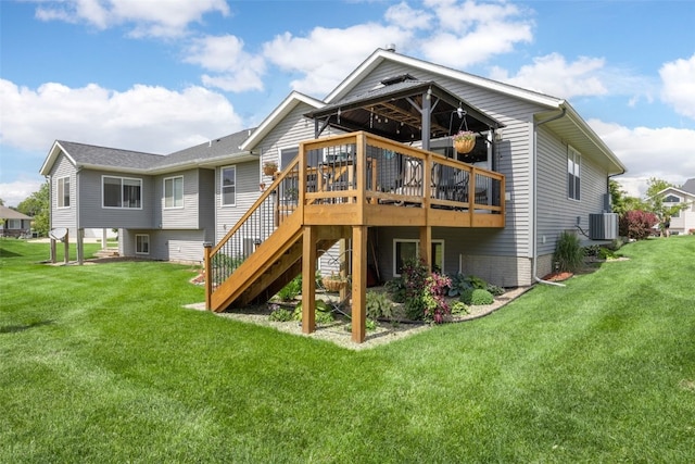 2205 Snapdragon Cir SW, Cedar Rapids, IA 52404 - back of house featuring a deck, stairway, a lawn, and central AC unit