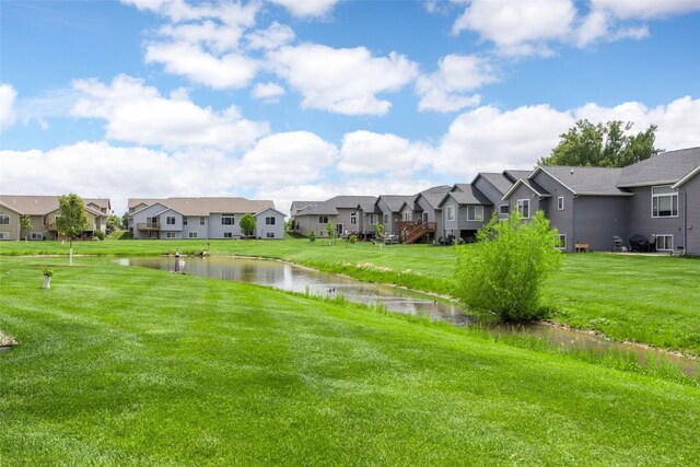 2205 Snapdragon Cir SW, Cedar Rapids, IA 52404 - view of grassy yard featuring a residential view and a water view