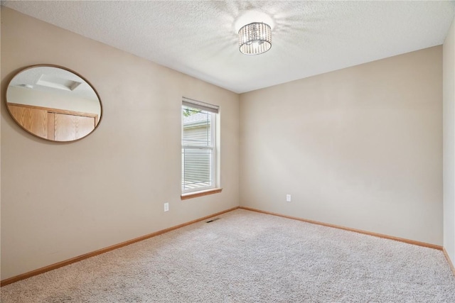 1562 Hunters Creek Way, Marion, IA 52302 - empty room with carpet floors and a textured ceiling