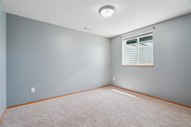 1562 Hunters Creek Way, Marion, IA 52302 - empty room with carpet floors and a textured ceiling