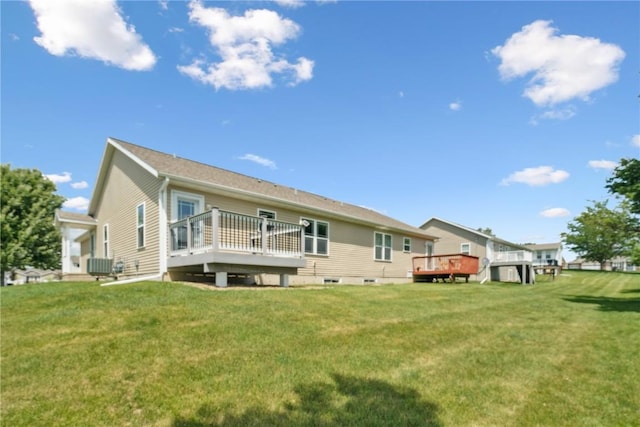 1562 Hunters Creek Way, Marion, IA 52302 - rear view of house with a deck and a yard