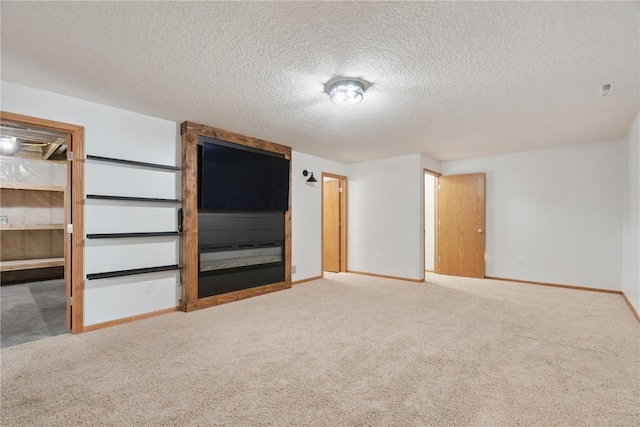 1562 Hunters Creek Way, Marion, IA 52302 - unfurnished bedroom featuring carpet flooring and a textured ceiling