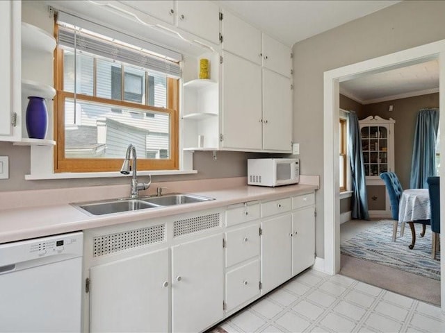 1813 3rd Ave SE, Cedar Rapids, IA 52403 - kitchen featuring white appliances, a sink, open shelves, and white cabinets