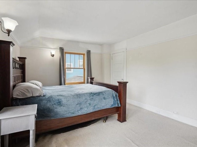 1813 3rd Ave SE, Cedar Rapids, IA 52403 - carpeted bedroom featuring vaulted ceiling