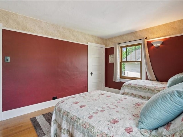 1813 3rd Ave SE, Cedar Rapids, IA 52403 - bedroom with wood finished floors and baseboards