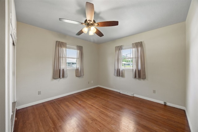 2705 14th Ave, Marion, IA 52302 - empty room with baseboards, wood finished floors, and a ceiling fan