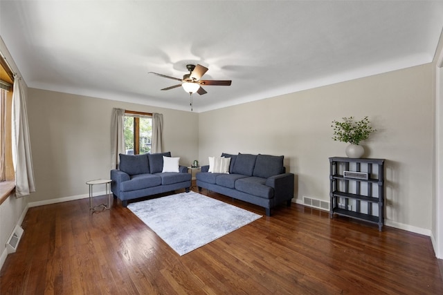 2705 14th Ave, Marion, IA 52302 - living room featuring ceiling fan, dark wood-style floors, and baseboards