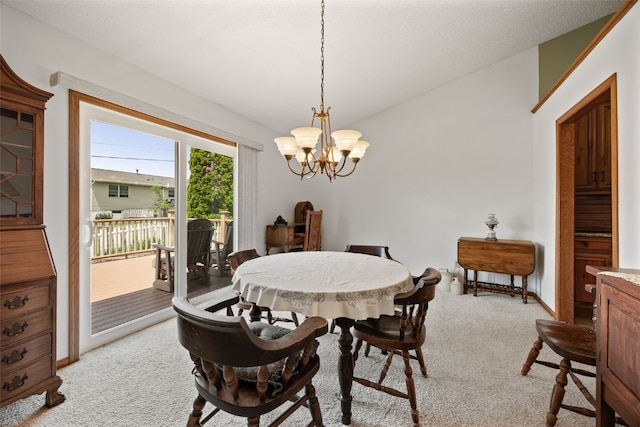 1724 Hamer Dr NW, Cedar Rapids, IA 52405 - dining space with light colored carpet, a chandelier, and vaulted ceiling