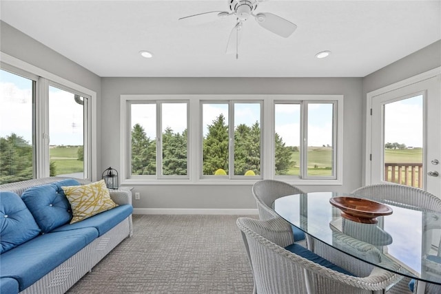 1355 Red Star Rd, Tipton, IA 52772 - sunroom featuring baseboards, ceiling fan, carpet flooring, and recessed lighting