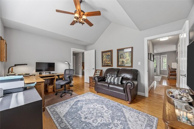 1355 Red Star Rd, Tipton, IA 52772 - home office with ceiling fan, lofted ceiling, light wood-style flooring, and baseboards