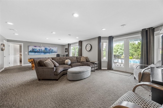 1355 Red Star Rd, Tipton, IA 52772 - carpeted living room with french doors, baseboards, and recessed lighting