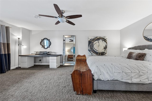1355 Red Star Rd, Tipton, IA 52772 - carpeted bedroom with an office area, ceiling fan, and baseboards