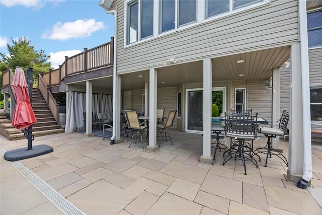 1355 Red Star Rd, Tipton, IA 52772 - view of patio / terrace with outdoor dining area and stairs