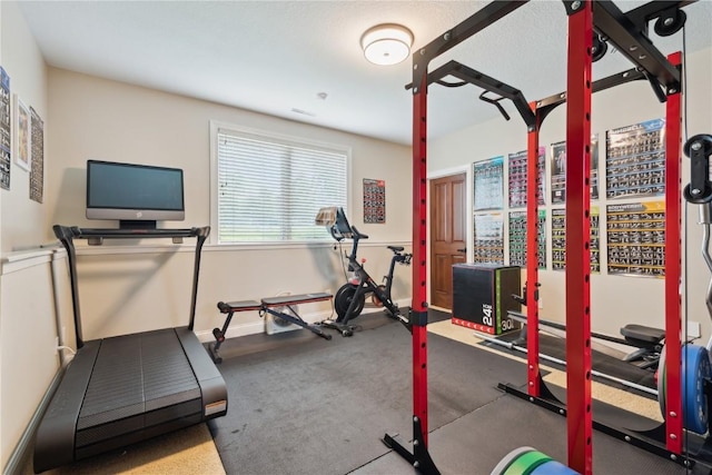 1485 Huntington Hills Dr, Marion, IA 52302 - workout room with baseboards