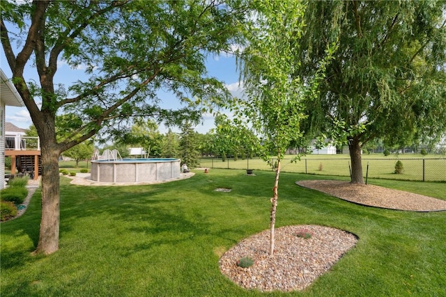 1485 Huntington Hills Dr, Marion, IA 52302 - view of yard with a wooden deck
