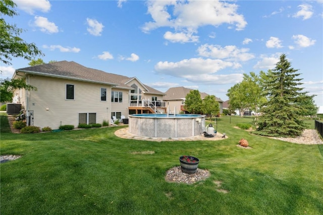 1485 Huntington Hills Dr, Marion, IA 52302 - view of green lawn featuring cooling unit and an outdoor pool