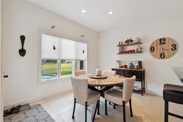 1485 Huntington Hills Dr, Marion, IA 52302 - dining room featuring recessed lighting, baseboards, and light tile patterned flooring