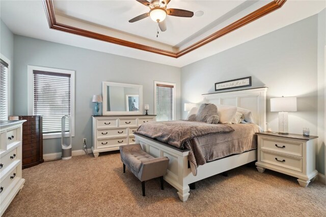 1485 Huntington Hills Dr, Marion, IA 52302 - bedroom with light carpet, a raised ceiling, baseboards, ornamental molding, and a ceiling fan