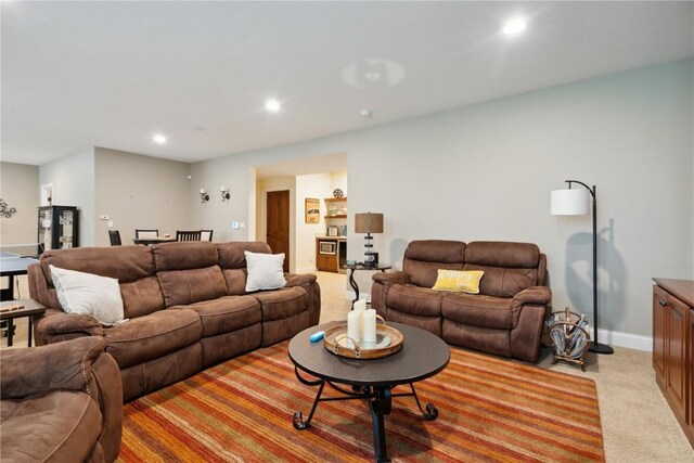 1485 Huntington Hills Dr, Marion, IA 52302 - living room with light colored carpet, recessed lighting, and baseboards