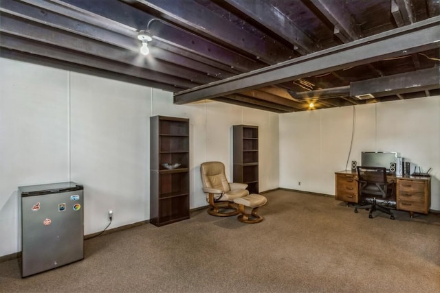 5817 Underwood SW, Cedar Rapids, IA 52404 - finished basement featuring carpet flooring, an office area, freestanding refrigerator, and baseboards