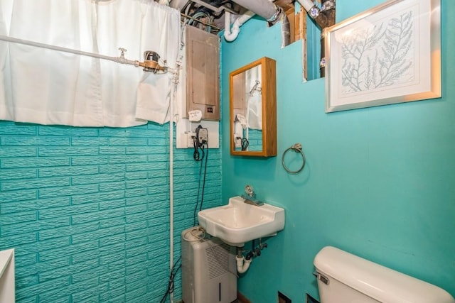 5817 Underwood SW, Cedar Rapids, IA 52404 - bathroom with toilet and a sink