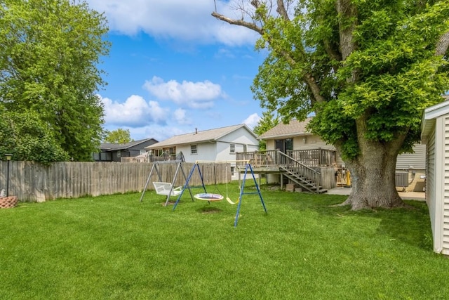 5817 Underwood SW, Cedar Rapids, IA 52404 - view of yard with a deck and stairway