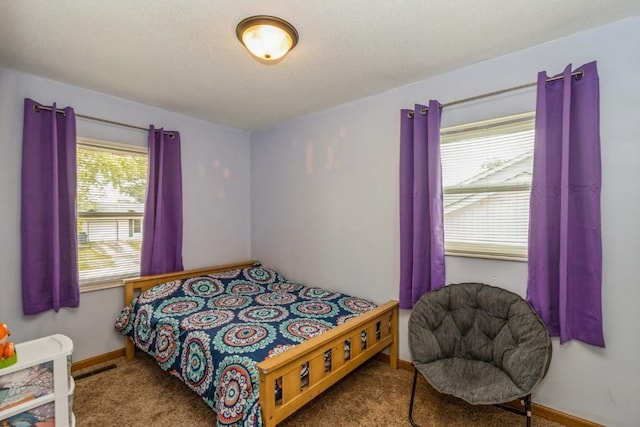 5817 Underwood SW, Cedar Rapids, IA 52404 - carpeted bedroom with baseboards