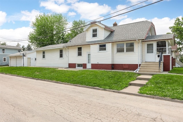 2220 D St SW, Cedar Rapids, IA 52404 - view of front of home with roof with shingles, a front lawn, entry steps, and a chimney